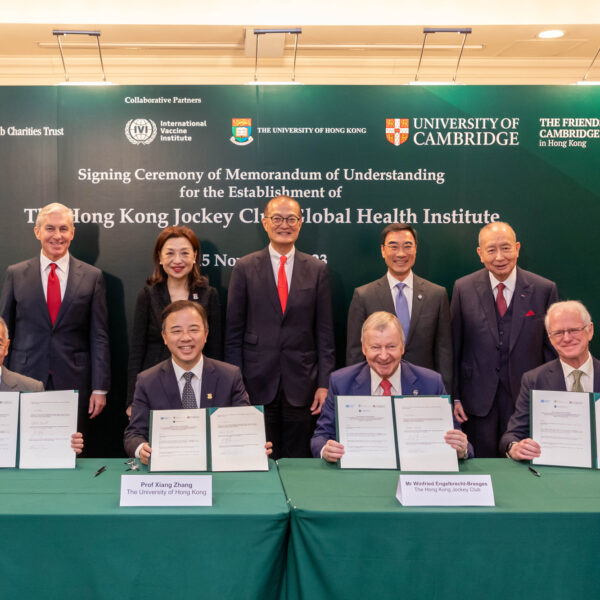 Witnessed by the Secretary for Health of the HKSAR Government Professor Lo Chung-mau (back row, center); Club Chairman Michael Lee (back row, 2nd right); Pro-Chancellor of HKU and Founding Chairman of the Friends of Cambridge University in Hong Kong Dr the Hon Sir David Li (back row, 1st right); the Chairman of the Council of HKU Priscilla Wong (back row, 2nd left); and the Chairperson of the Board of Trustees of the IVI George Bickerstaff (back row, 1st left), the MOU was signed by Club CEO Winfried Engelbrecht-Bresges (front row, 2nd right); the President and Vice-Chancellor of HKU Professor Xiang Zhang (front row, 2nd left); Regius Professor of Physic and Head of the School of Clinical Medicine of the University of Cambridge Professor Patrick Maxwell (front row, 1st right) and the Director General of the IVI Dr Jerome Kim (front row, 1st left). Credit: HKJC